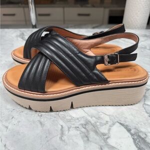 Black leather, strappy Corso Como sandal.
